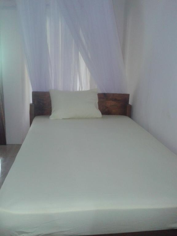 Fantastic Cottages Gili Meno Rom bilde
